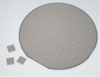 Fig. 2. A micromachined wafer stack, enabling chipscale vacuum packaging. 